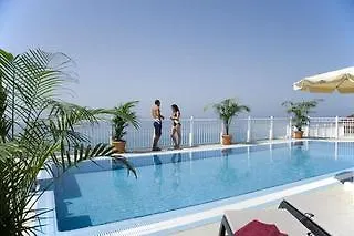 Sercotel Perla Marina Отель